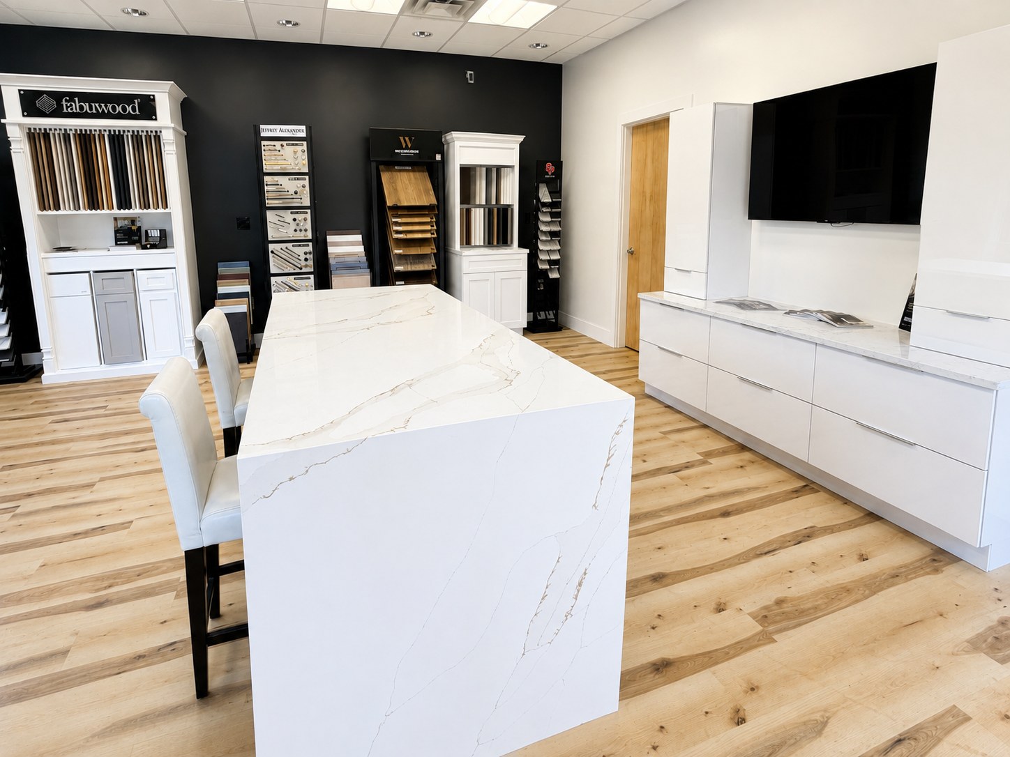 Inside the Nova showroom: quartz waterfall island and cabinet displays